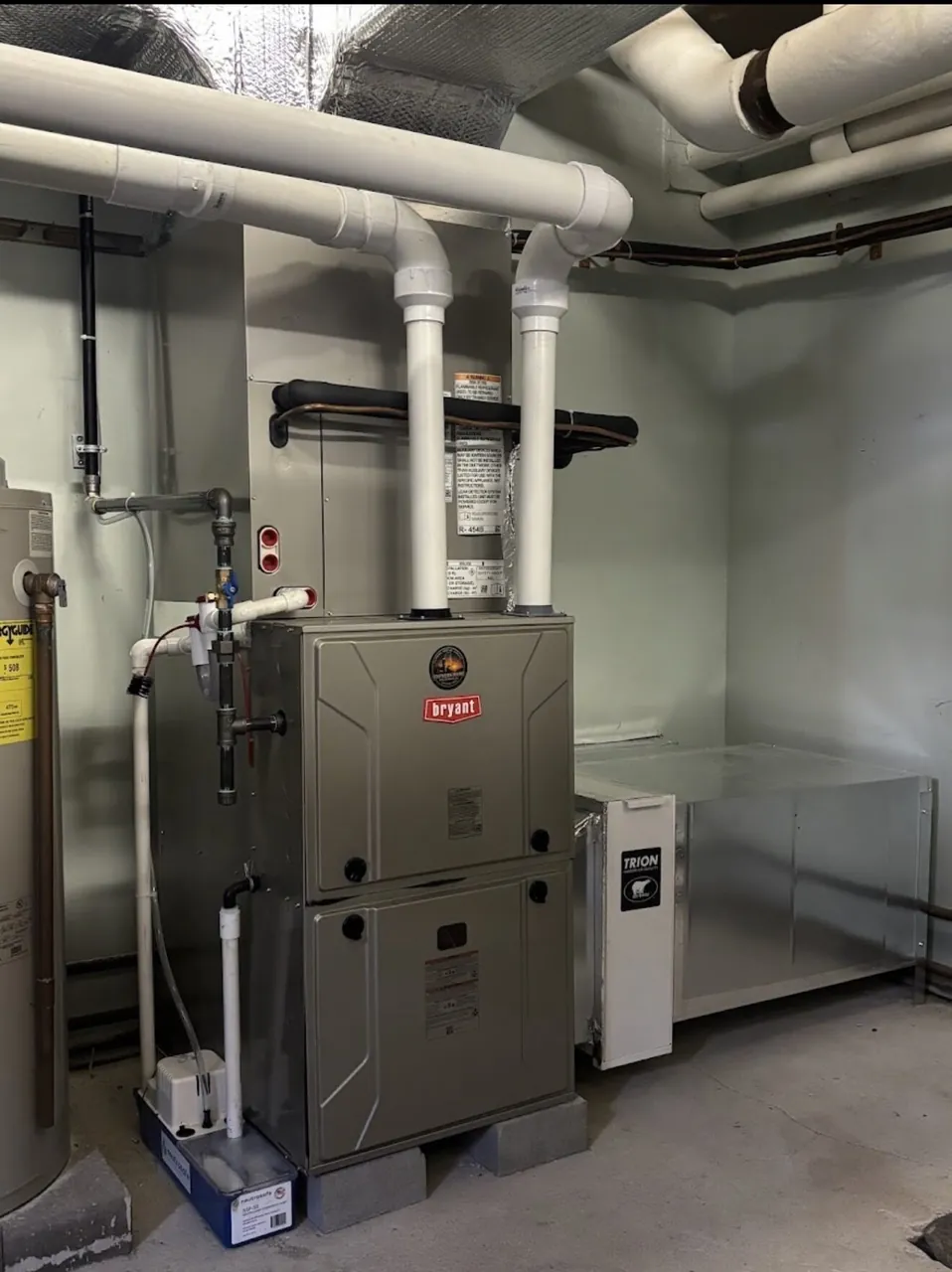 Bryant high-efficiency natural gas furnace with a Trion air cleaner — dual fuel system in Portland, Maine